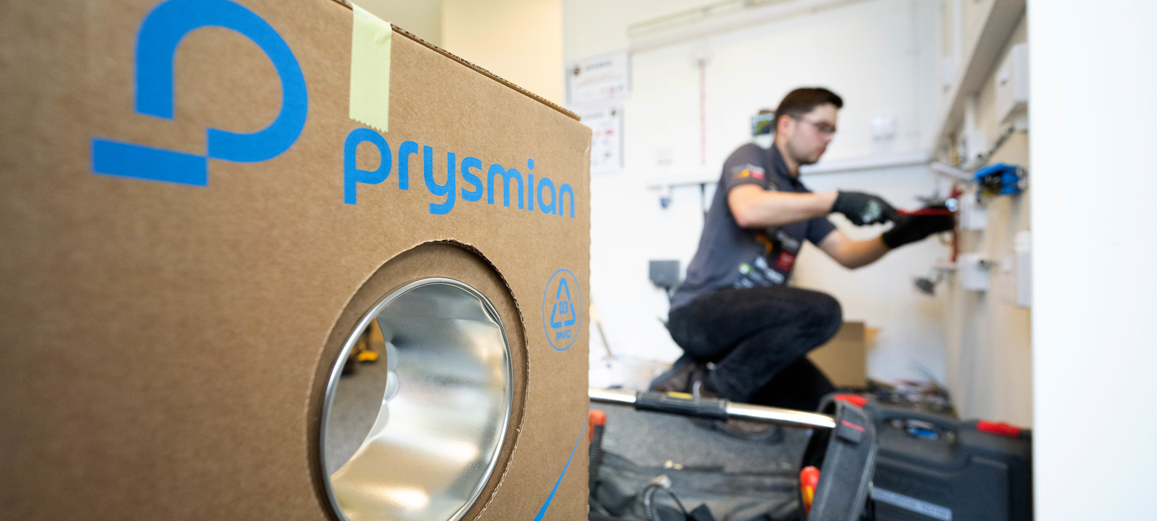 A young electrician installing Prysmian Twin and Earth cable.