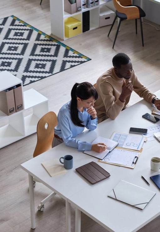 People working in a small office