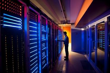 image showing rows of cabinets in a high spec data centre